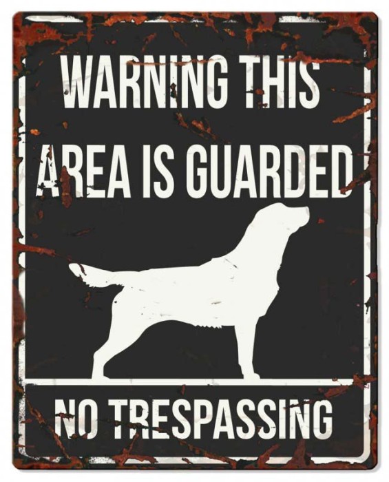 Varningsskylt med olika hundraser